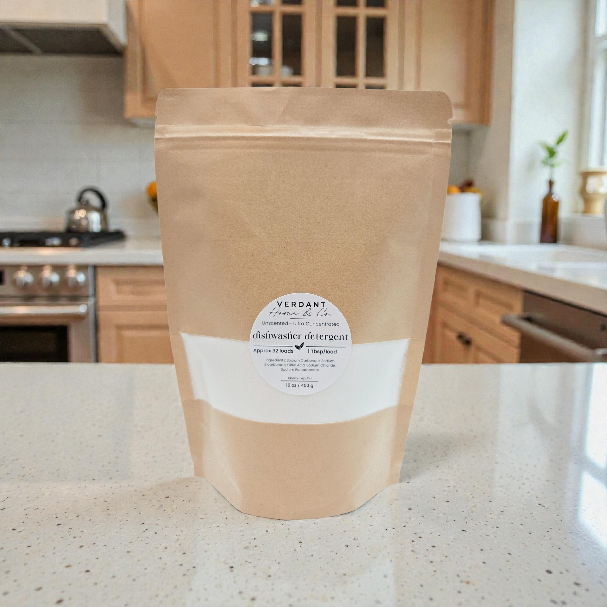 Kraft paper bag with a label on a kitchen counter that reads Dishwasher Detergent, 16oz